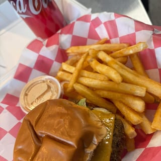 Lunch Special Plain Burger, Small fry and Canned drink.